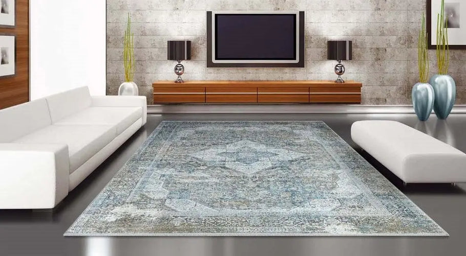 What is difference between Rug and Carpet?
